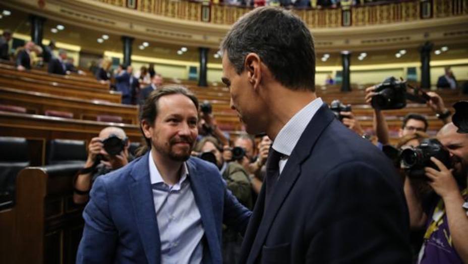 El presidente del Gobierno, Pedro Sánchez y Pablo Iglesias