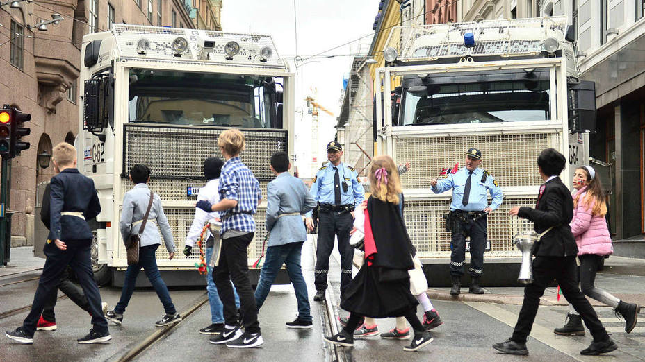 Police lorries block side streets during the celebration of Norways Constitution Day in Oslo
