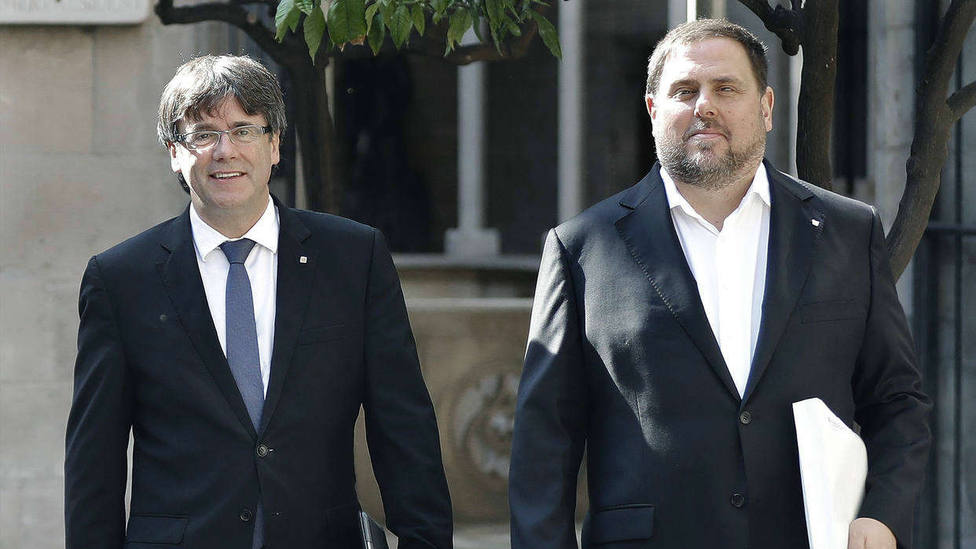 Imagen de archivo de cuando Puigdemont y Junqueras eran presidente y vicepresidente de la Generalitat.