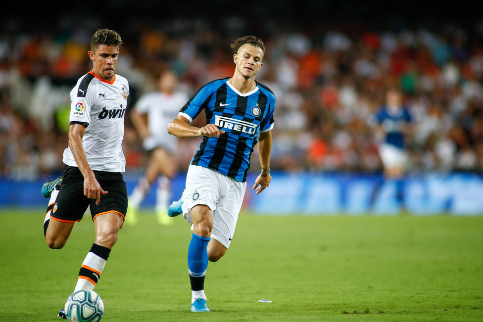 Gabriel Paulista of Valencia and Samuele Longo of Inter de Milan during the friendly football match played between Valencia CF and Inter de Milan at Mestalla Stadium in Valencia, Spain, on August 10, 2019.