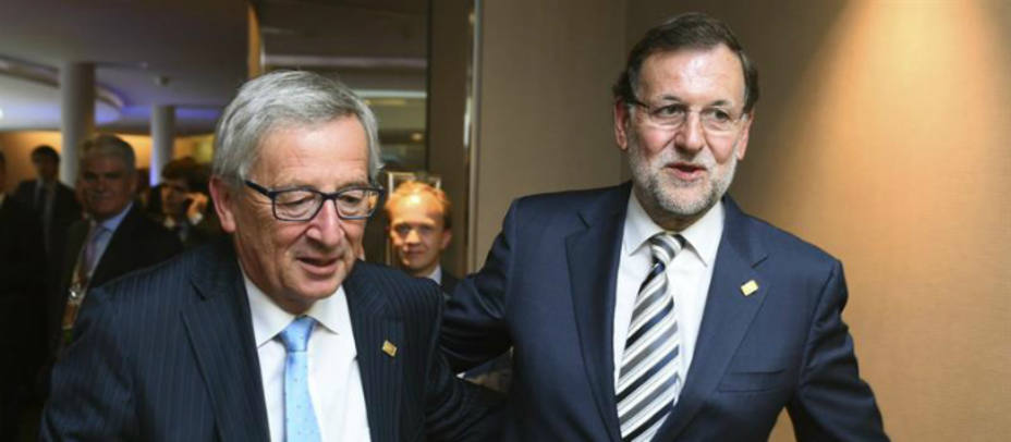 Jean-Claude Juncker y Mariano Rajoy este sábado en Bruselas. EFE