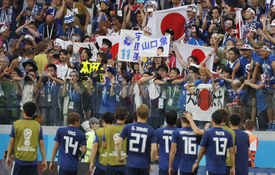 Los jugadores de Japón celebran su clasificación