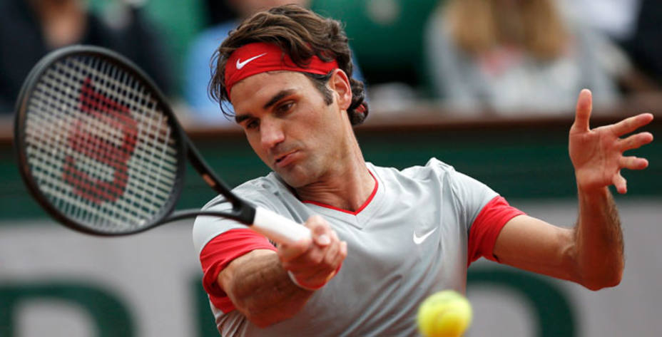 Federer comenzó con éxito su defensa del título en Halle. Reuters.