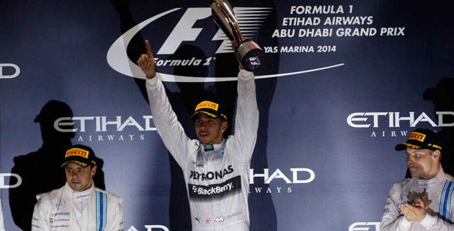 Podio del GP de Abu Dhabi: Massa (2º), Hamilton (1º) y Bottas (3º). Reuters.