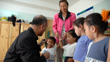 Painet is1502 mongolia catholic bishop wens padilla visiting verbist center for street children