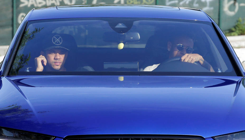 Brazilian soccer player Neymar drives to arrives to Joan Gamper training camp near Barcelona