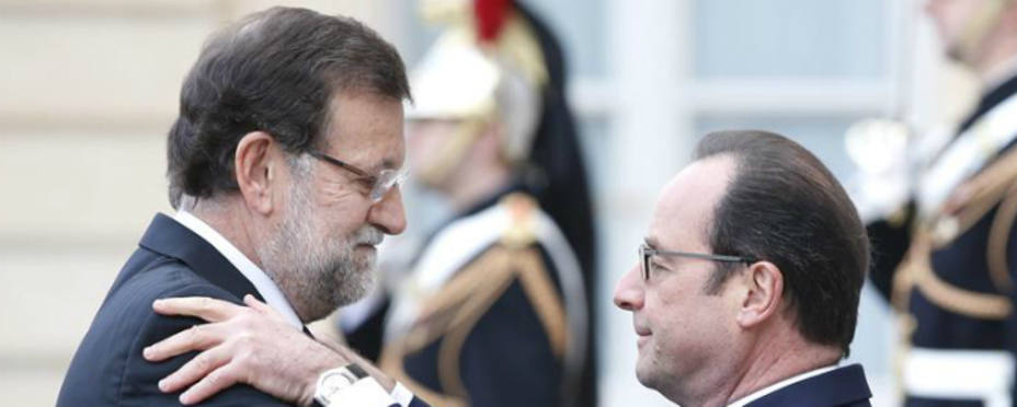 Rajoy junto a Hollande. REUTERS