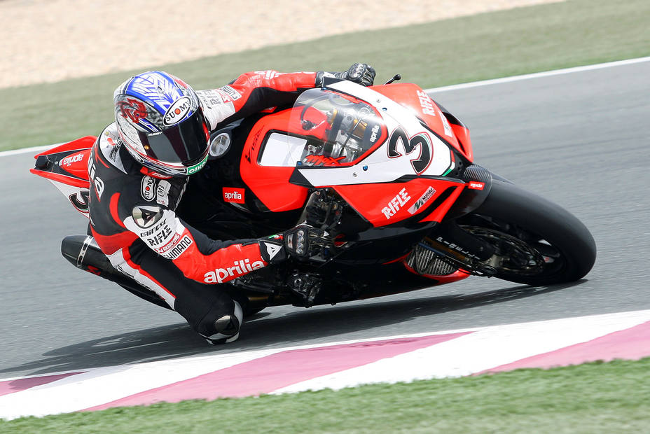 FILE PHOTO: Italys superbike rider Biaggi rides to third place in race 1 of Qatar round of Superbike World Championship in Doha