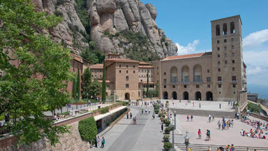 Montserrat, Spain - June 12, 2015: The Benedictine abbey Santa Maria de Montserrat