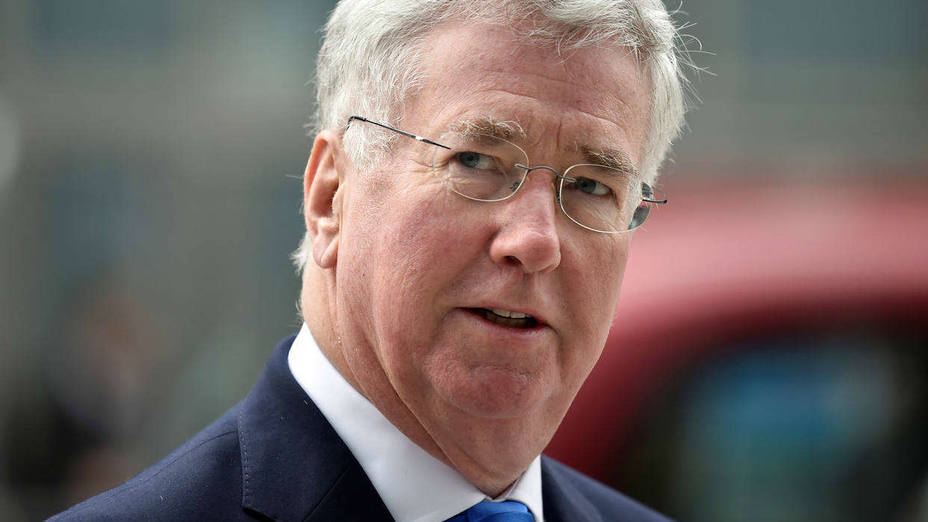 FILE PHOTO: British Defence Secretary Michael Fallon arrives at the National Cyber Security Centre in London