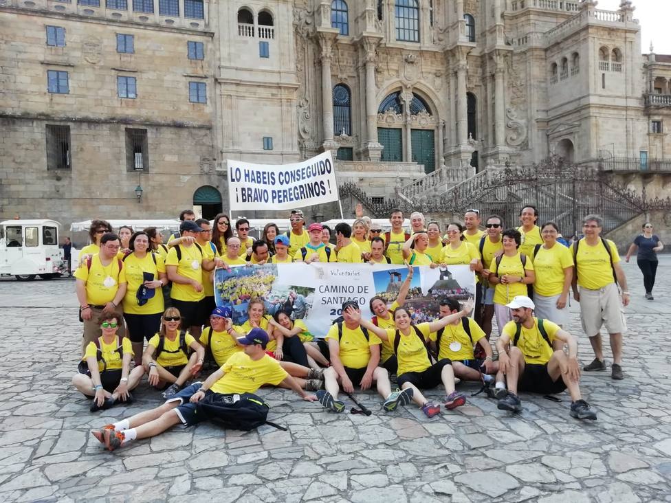 Los peregrinos de la Fundación Down Madrid completan entre aplausos el Camino en nueve días desde Sarria (Lugo)