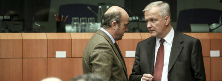 Oli Rehn y Luis de Guindos / Foto: EFE