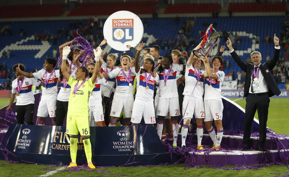 Lyon celebrate with the trophy after winning the UEFA Womens Champions League Final