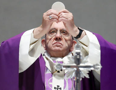 Pope Francis leads a mass at the Roman parish of San Gelasio in Rome