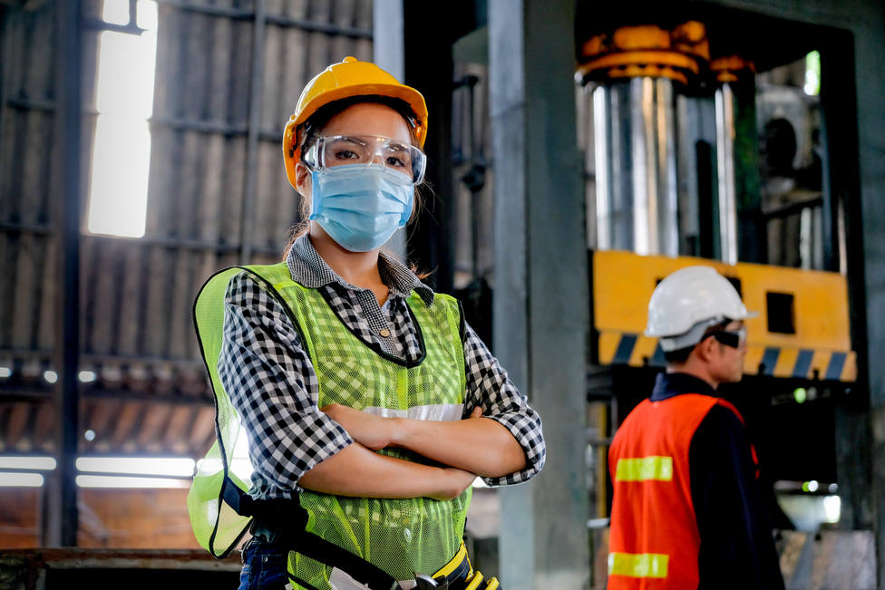 Factory,Woman,Worker,Or,Technician,With,Hygienic,Mask,Stand,With