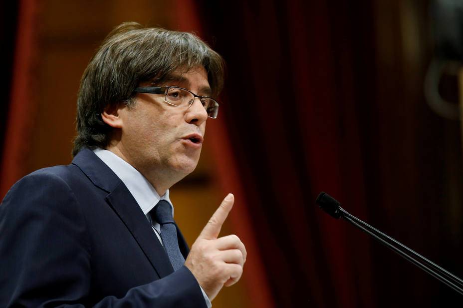 FILE PHOTO - Puigdemont speaks during a confidence vote session at Catalan Parliament in Barcelona