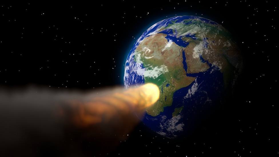Una imagen ficticia de un asteroide en dirección a la Tierra