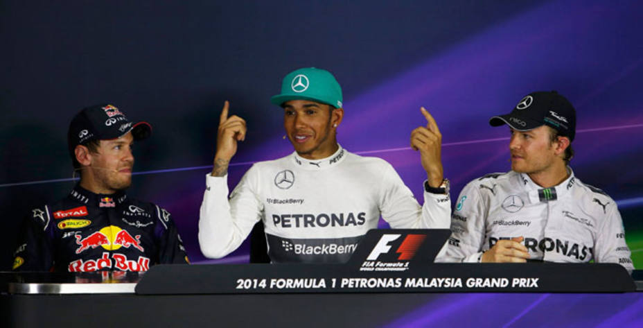 Hamilton, Vettel y Rosberg durante la rueda de prensa posterior a la calificación. Reuters.