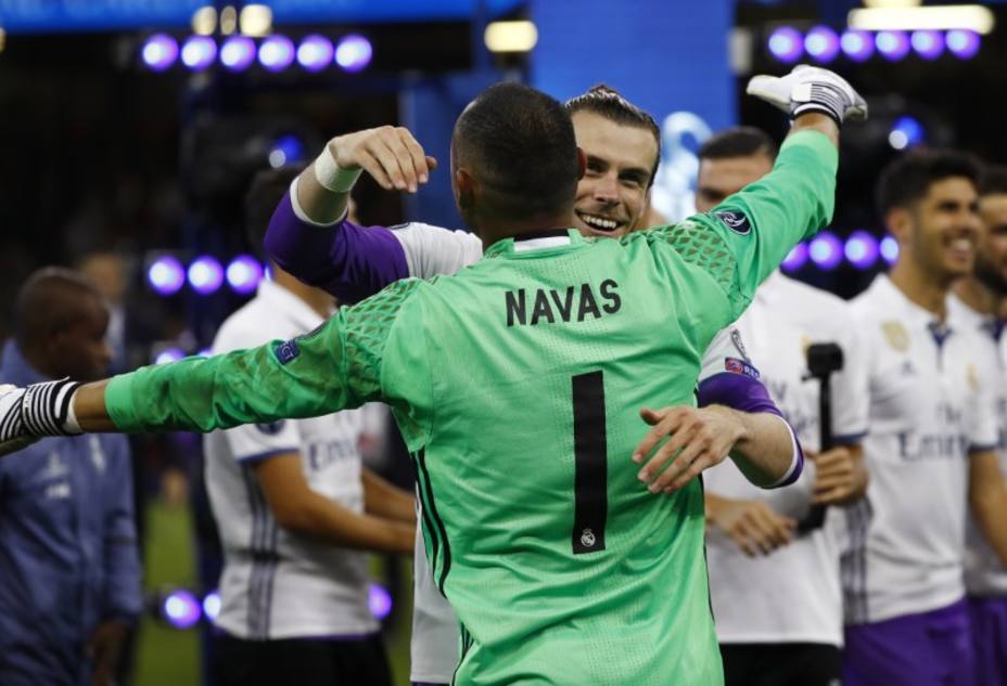 Real Madrids Gareth Bale and Keylor Navas celebrate after the match