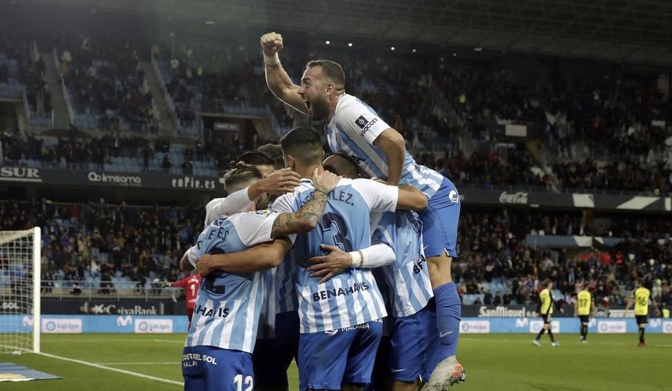 La imagen del partido, el Málaga una piña