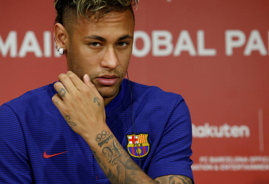 FC Barcelona player Neymar attends a news conference to announce the sponsorship deal between the team and Rakuten Inc. in Tokyo