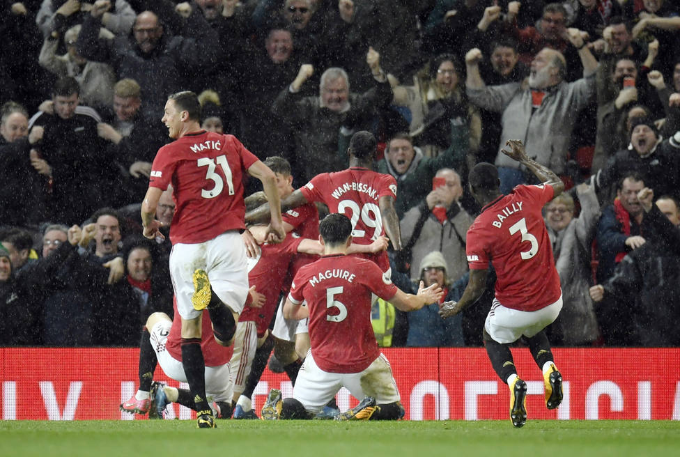 Los jugadores del United celebran el segundo gol ante el City (EFE)