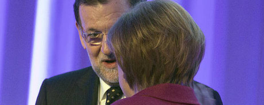 Mariano Rajoy junto a Angela Merkel. Foto PP