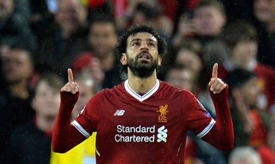 Salah celebra uno de los goles marcados para el Liverpool ante la Roma en la ida de las semifinales de la Liga de Campeones. EFE
