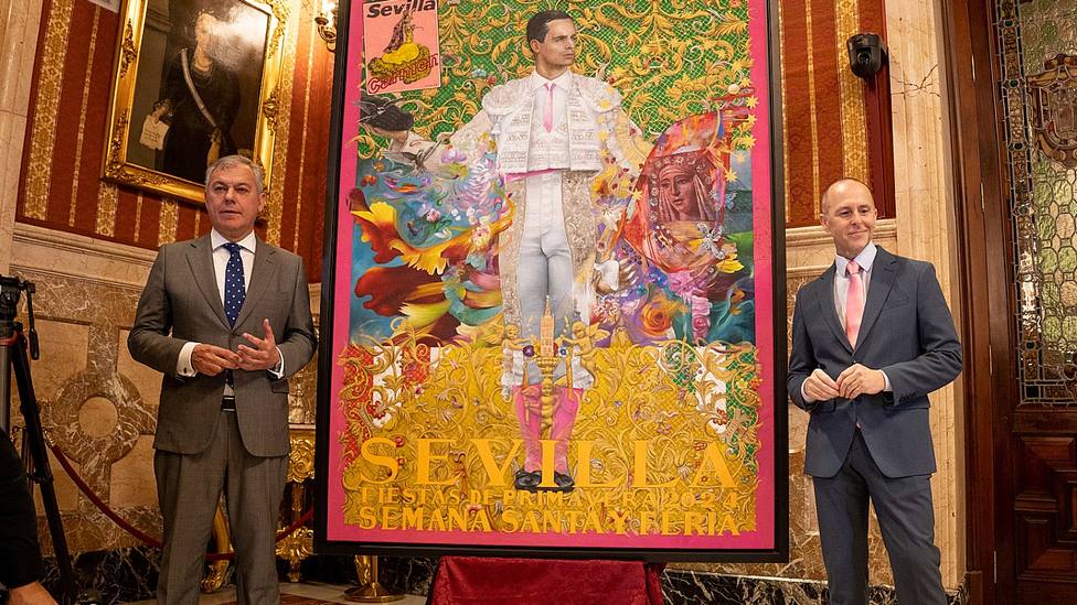 José Luis Sanz, alcalde de Sevilla, junto a Antoine Cas y el cartel de las fiestas sevillanas