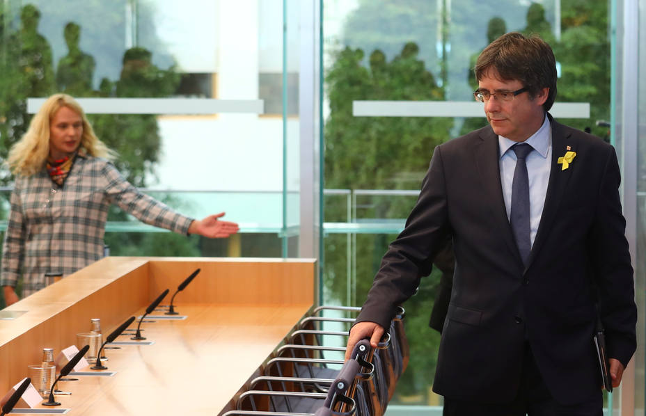 Former Catalan leader Puigdemont arrives for a news conference in Berlin