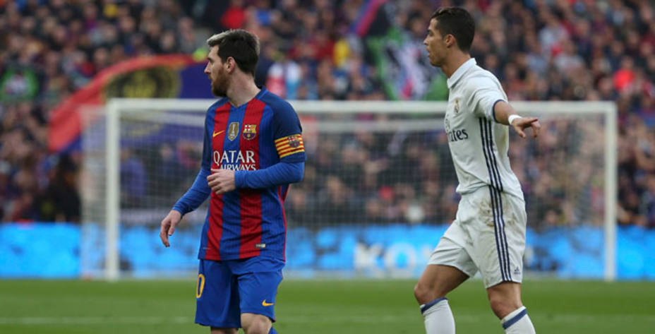 Cristiano y Messi, durante un encuentro de esta temporada (FOTO - Reuters)
