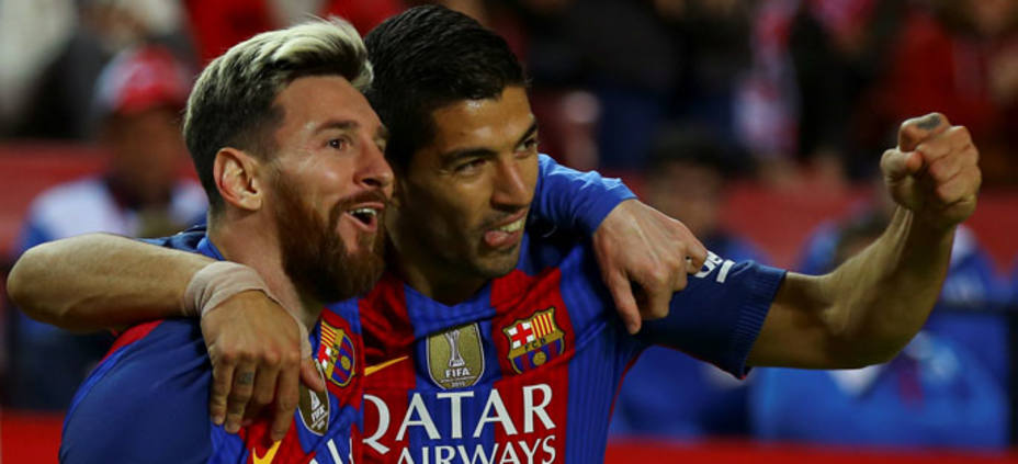Messi y Luis Suárez, autores de los goles ante el Sevilla. REUTERS
