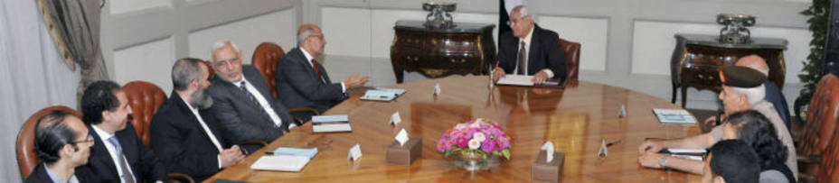 El Baradei y Mansur reunidos en el Palacio Presidencial. REUTERS