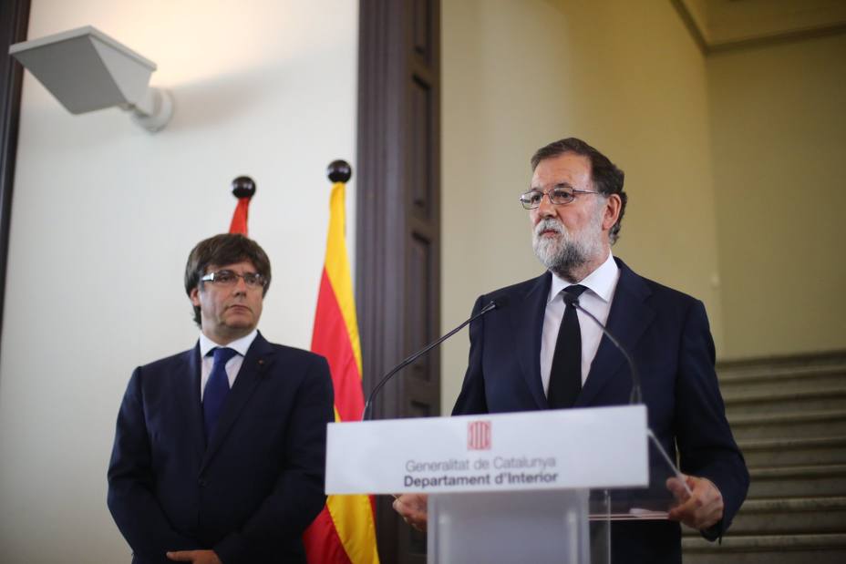 Mariano Rajoy y Carles Puigdemont este viernes en Barcelona