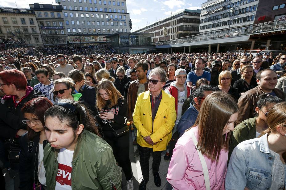 Fans of Avicii gather to honour him in central Stockholm