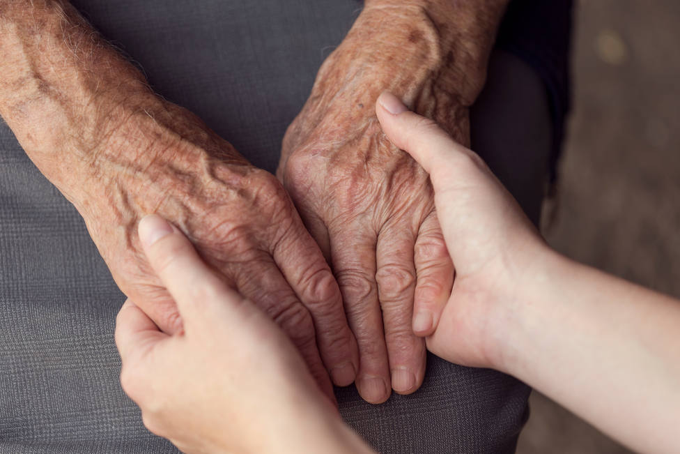 Old,And,Young,Person,Holding,Hands.,Elderly,Care,And,Respect,