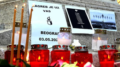 People pay respect for the victims of shooting at Belgrade elementary school