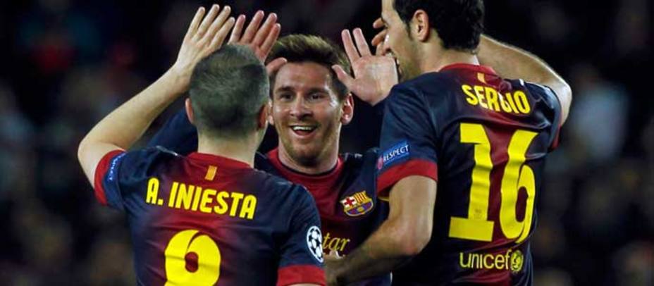 Messi, Iniesta y Busquets celebrando un gol. REUTERS