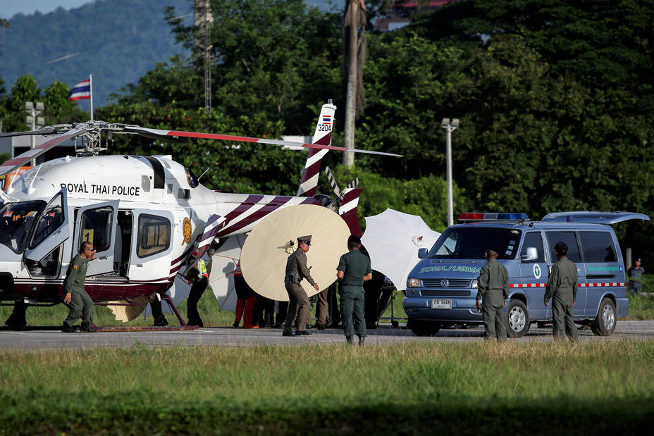 Rescued schoolboys are moved from a Royal Thai Police helicopter to an awaiting ambulance at a military airport in Chiang Rai